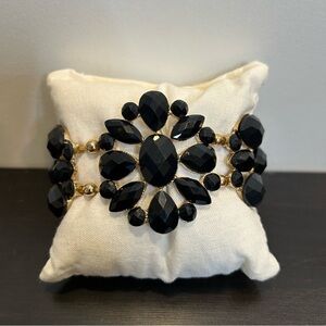 Black Stones Gold Tone Stretch Bracelet